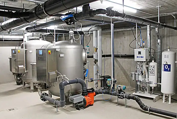 Commercial pool cleaning equipment room.