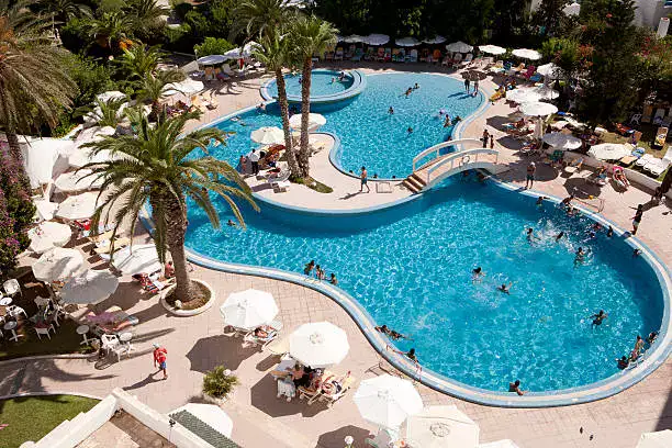 Resort Pool With swimmers.